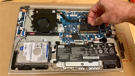 How to install additional RAM in a Lenovo laptop .